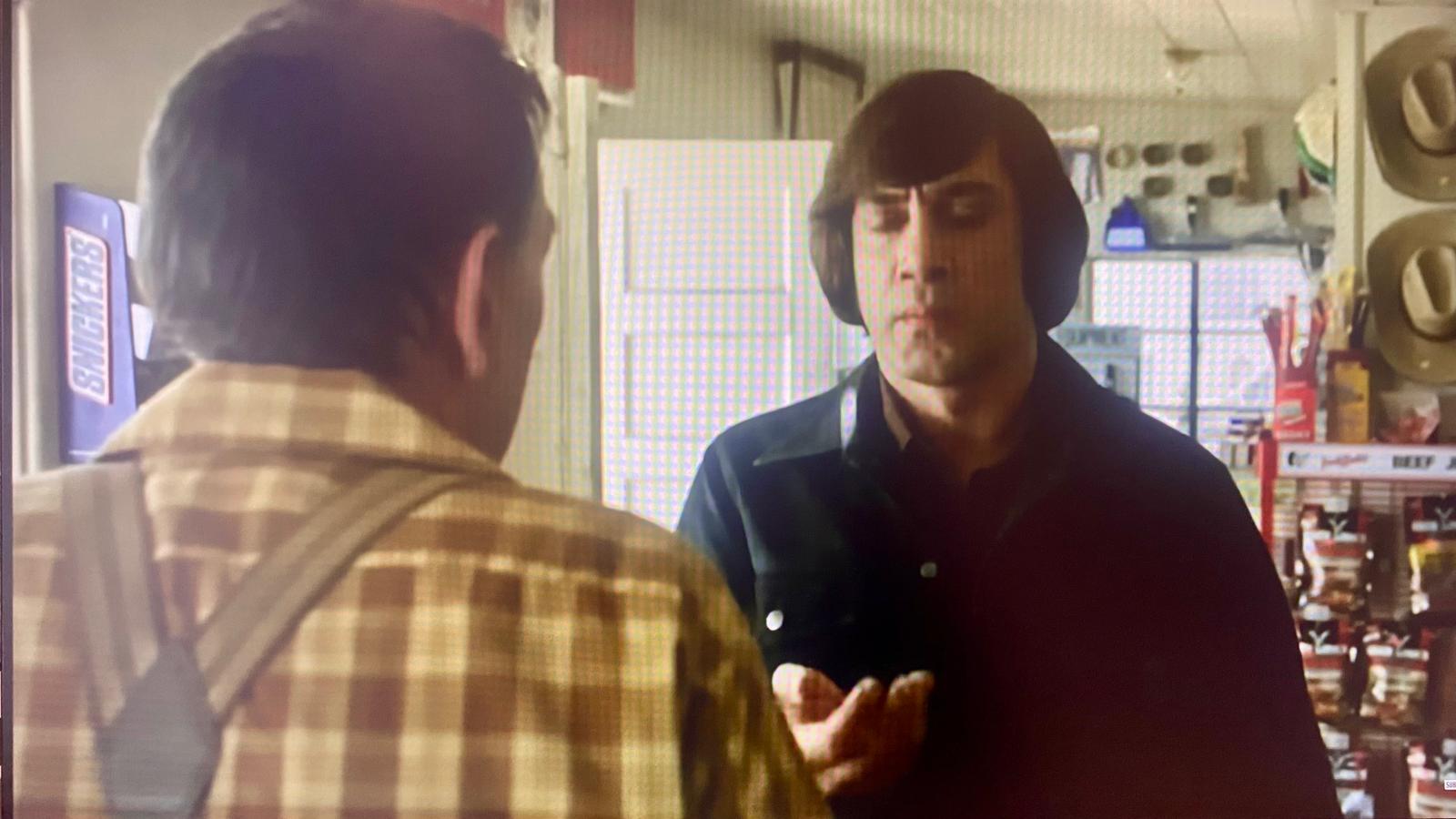 Coin toss scene from No Country for Old Men